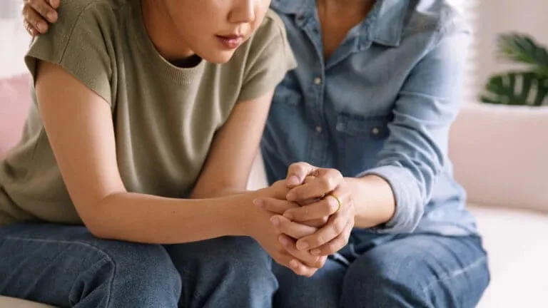 A patient and provider talk during an anxiety treatment therapy session at Abundance Health Care