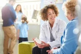 A family medicine provider discusses treatment options with a patient at a Colorado Springs practice